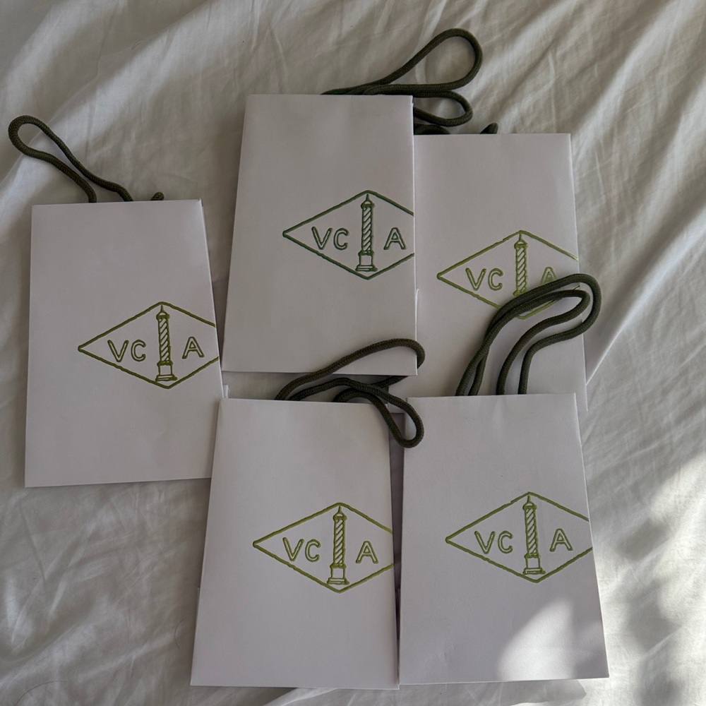 Van Cleef & Arpels White Bags with Green Logo